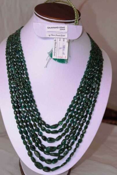 An image of 7 strings Emerald Crystal Necklace (Oval Beads of Zambian Emerald Gemstone) or Zambian Panna Maniya Mala