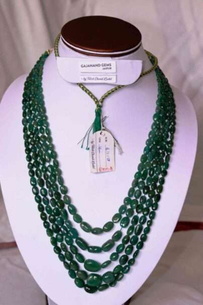 A picture of 5 line emerald necklace (oval beads) or Zambian panna maniya