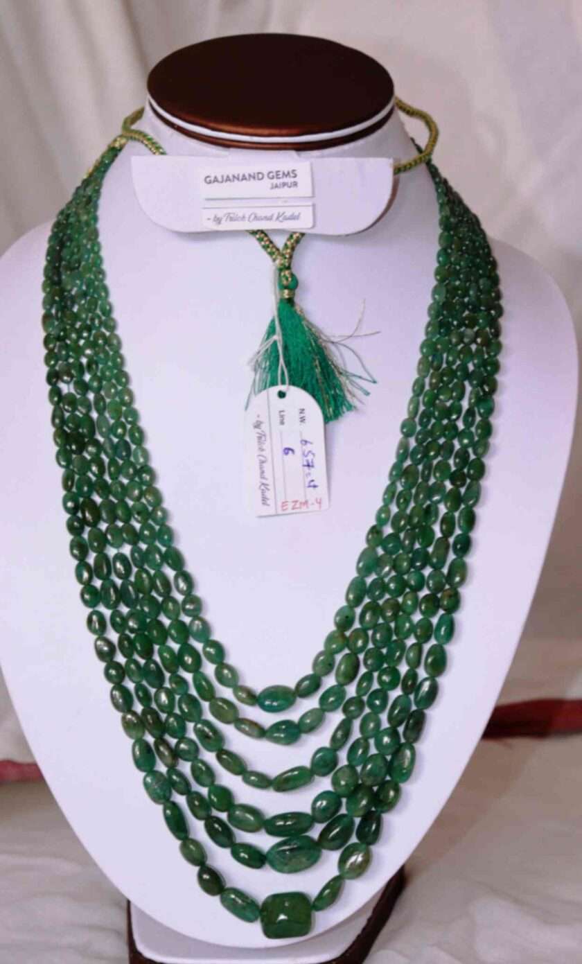 A picture of 6 line emerald necklace (oval beads) or Zambian panna maniya