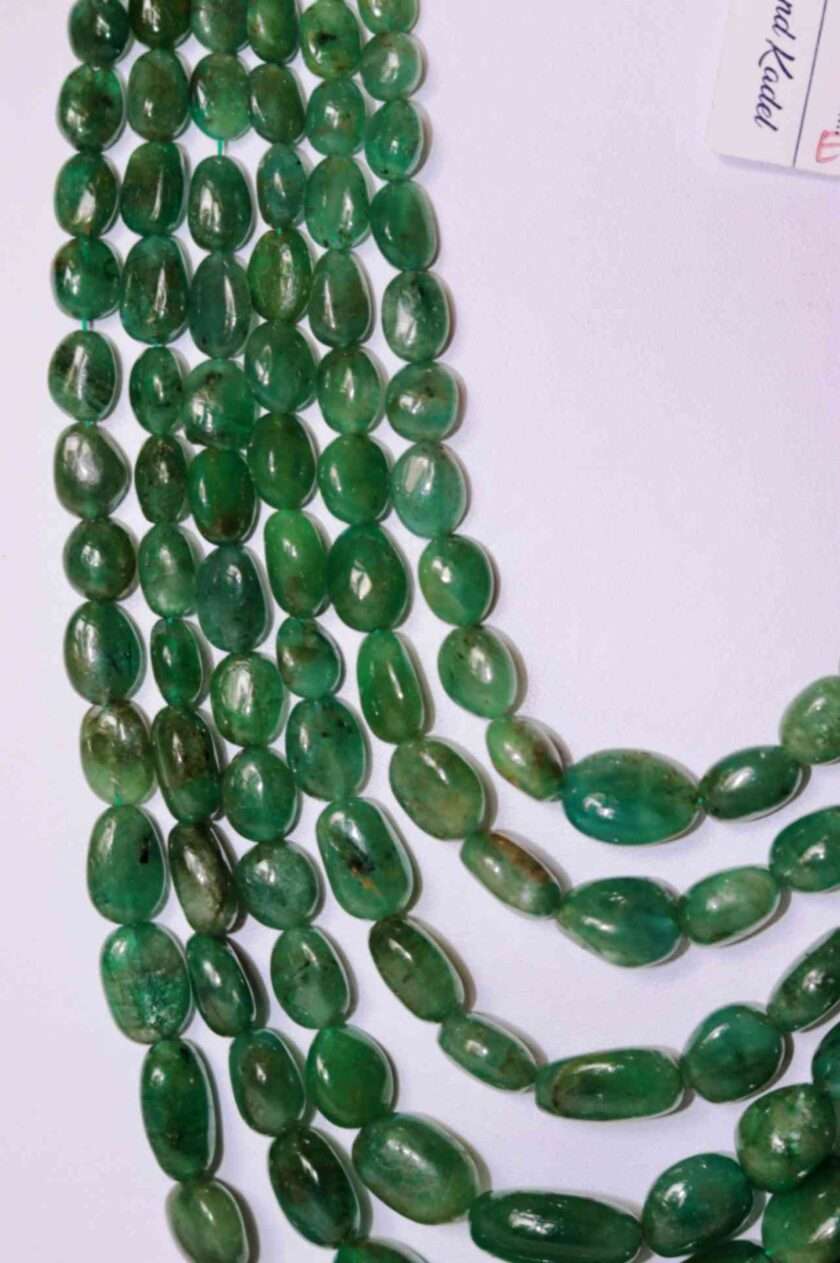 An image of 6 line emerald necklace (oval beads) or Zambian panna maniya