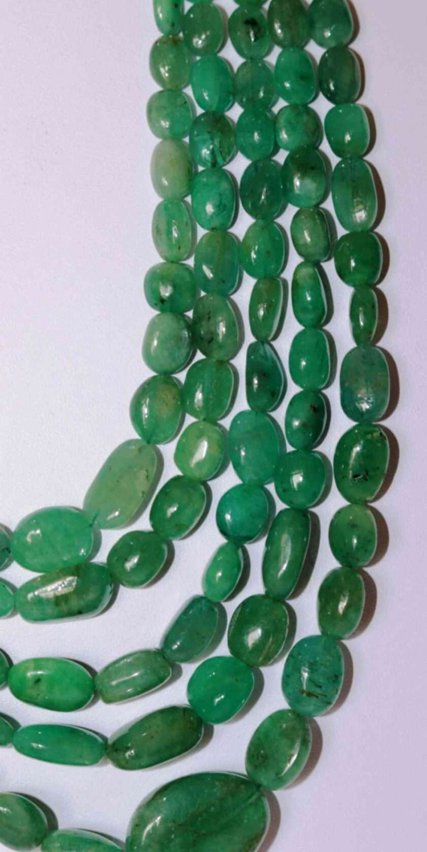 An image of 5 line emerald gemstone necklace (Zambian Panna Maniya mala) emerald oval beads