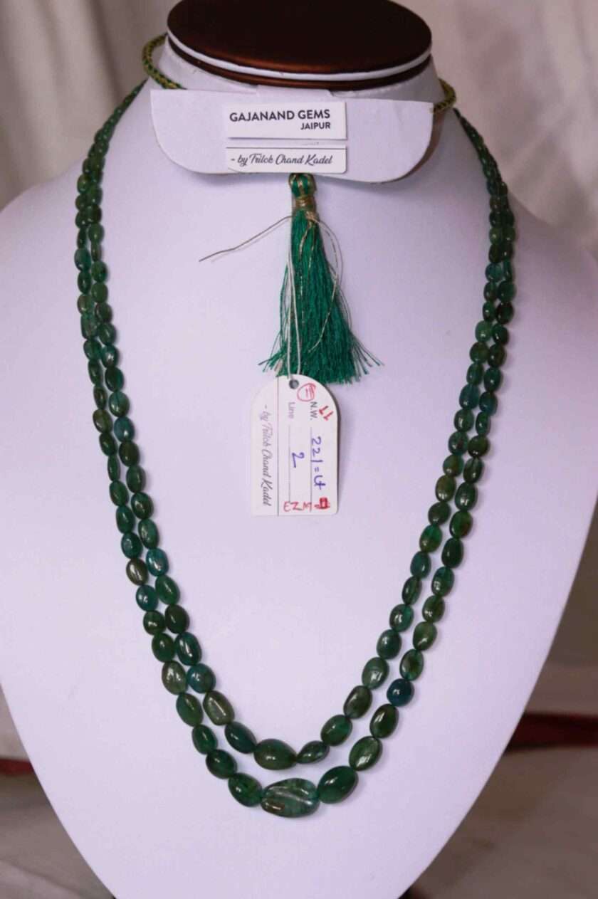 An image of 2 string emerald necklace (Panna Maniya) Zmabian emerald oval beads