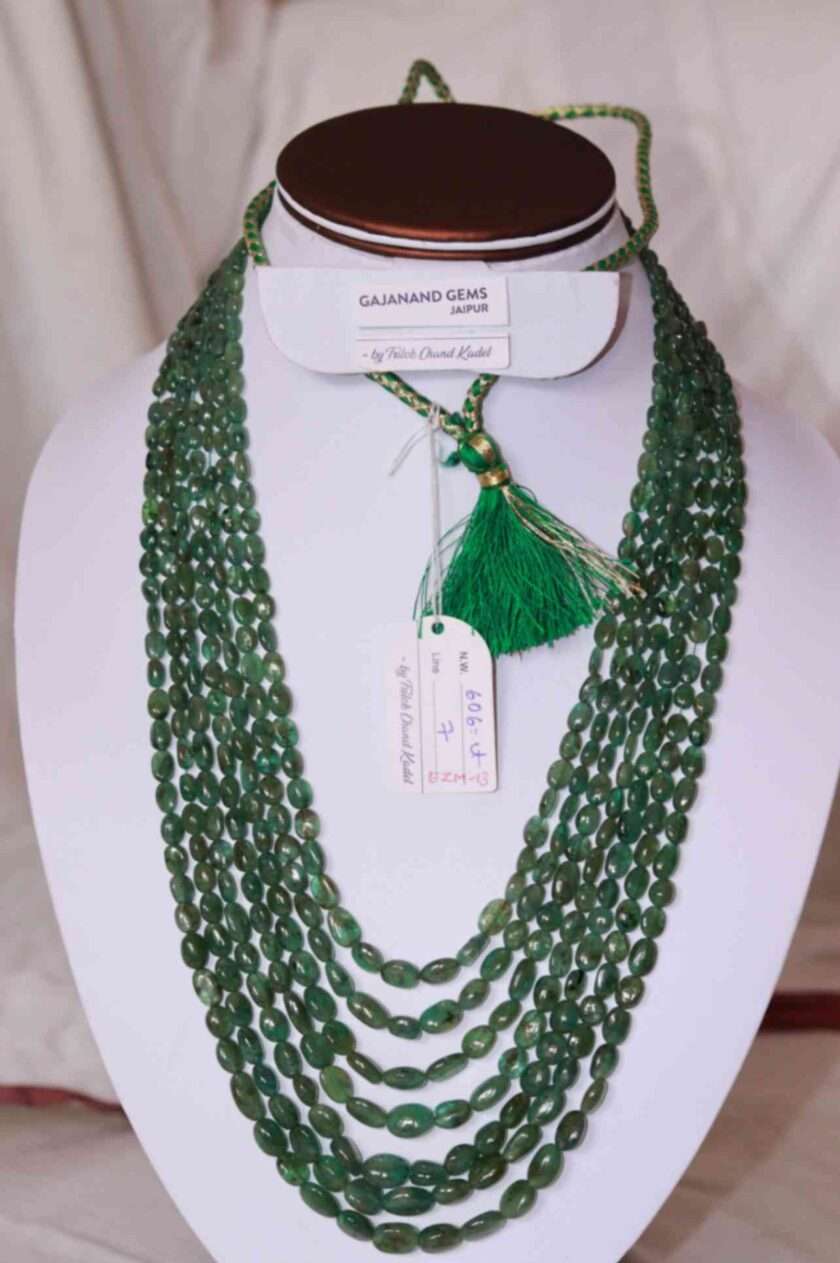 An image of 7 string emerald necklace (Panna Maniya mala) Zmabian emerald oval beads