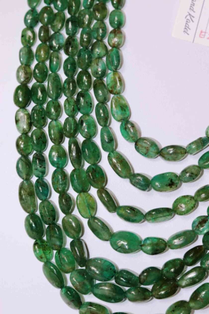 A picture of 7 string emerald necklace. Zambian Panna Maniya.